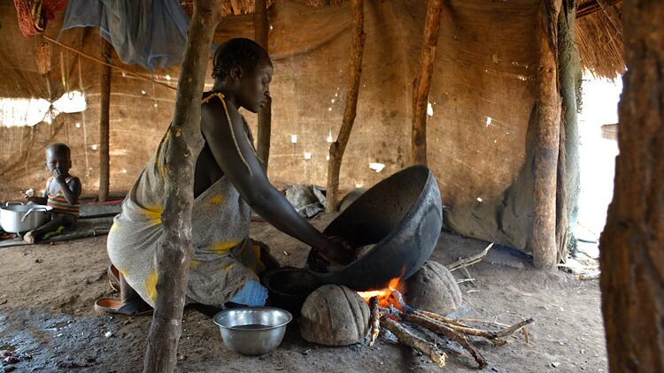 Opo woman cooking mapo.